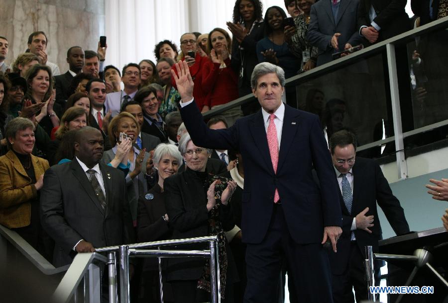 U.S. Secretary of State John Kerry greets employees during the welcoming ceremony at the Department of State in Washington D.C. on Feb.4, 2013. John Kerry was sworn in on Friday to succeed Hillary Clinton to become U.S. Secretary of State. (Xinhua/Fang Zhe) 