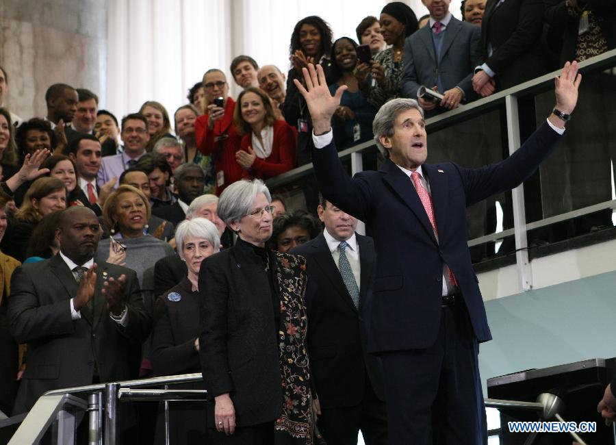 U.S. Secretary of State John Kerry greets employees during the welcoming ceremony at the Department of State in Washington D.C. on Feb.4, 2013. John Kerry was sworn in on Friday to succeed Hillary Clinton to become U.S. Secretary of State. (Xinhua/Fang Zhe) 