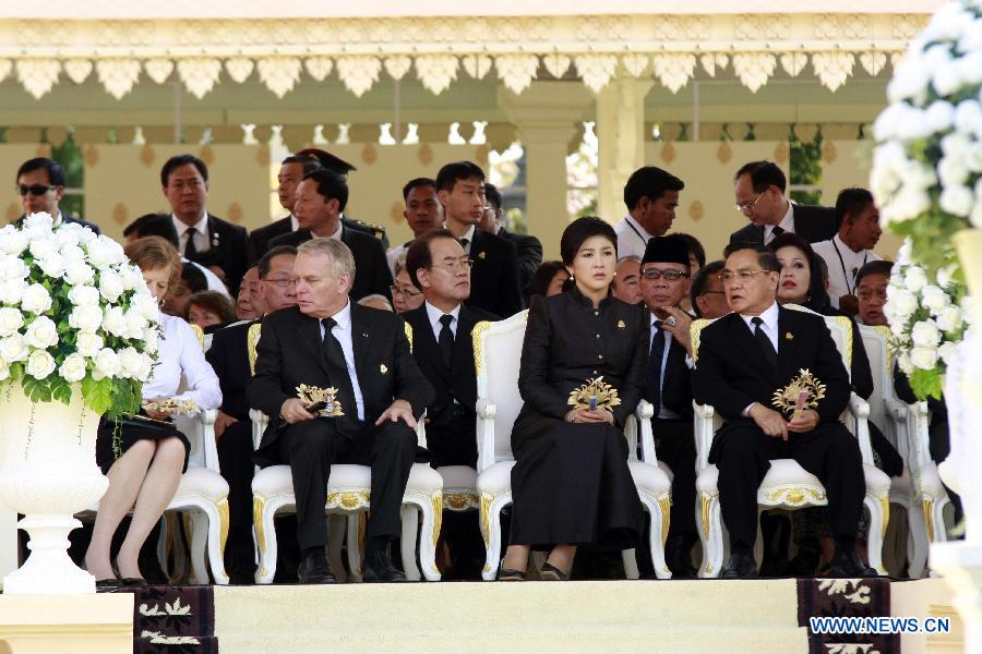 French Prime Minister Jean-Marc Ayrault (2nd L, front), Thai Prime Minister Yingluck Shinawatra (2nd R, front), and Laos Prime Minister Thongsing Thammavong (1st R, front) attend the cremation ceremony of late Cambodian King Father Norodom Sihanouk in Phnom Penh, Cambodia, Feb. 4, 2013. Cambodia began to cremate the body of the country's most revered King Father Norodom Sihanouk on Monday evening after it had been lying in state for more than three months at the capital's royal palace. (Xinhua/Sovannara)