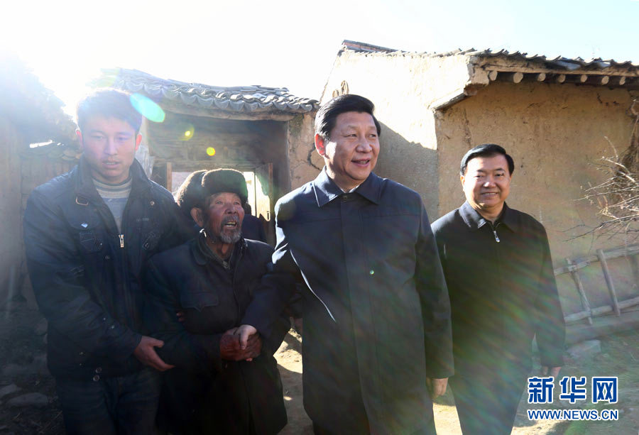 Xi Jinping (2nd R), general secretary of the Central Committee of the Communist Party of China (CPC) and also chairman of the CPC Central Military Commission, visits elderly Party member Ma Gang (2nd L) in the Yuangudui Village of the Weiyuan County in Dingxi, northwest China's Gansu Province, Feb. 3, 2013. Xi Jinping visited villages, enterprises and urban communities, chatting with impoverished villagers and asking about their livelihood during an inspection tour to Gansu from Feb. 2 to 5. During his visit, Xi also extended Spring Festival greetings to all Chinese people as the Spring Festival, or the Chinese Lunar New Year, approaches. (Xinhua/Lan Hongguang)