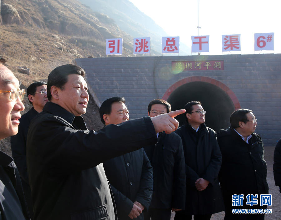 Xi Jinping, general secretary of the Central Committee of the Communist Party of China (CPC) and also chairman of the CPC Central Military Commission, visits a major water diversion project in the Weiyuan County of Dingxi City, northwest China's Gansu Province, Feb. 3, 2013. Xi Jinping visited villages, enterprises and urban communities, chatting with impoverished villagers and asking about their livelihood during an inspection tour to Gansu from Feb. 2 to 5. During his visit, Xi also extended Spring Festival greetings to all Chinese people as the Spring Festival, or the Chinese Lunar New Year, approaches. (Xinhua/Lan Hongguang)