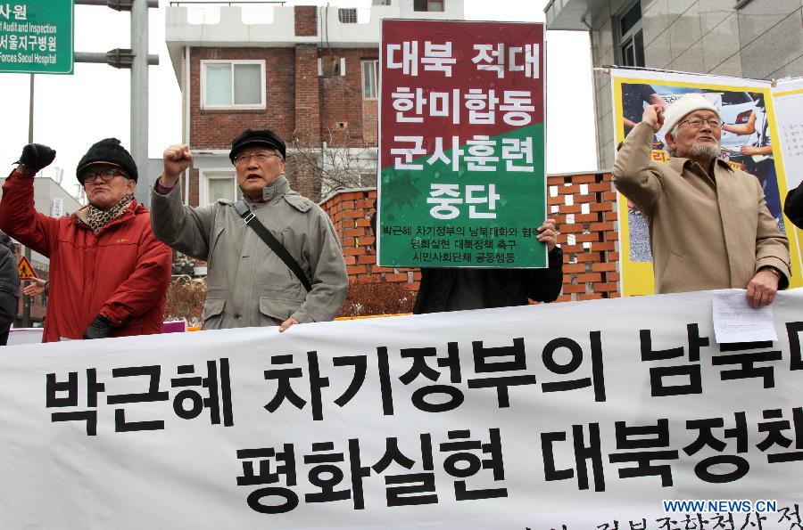 South Korean activitists attend a demonstration to protest against the joint naval military drill between South Korea and the United States in Seoul, South Korea, Feb. 5, 2013. South Korea and the United States launched a three-day joint naval military drill Monday in a show of force as speculation abounds over a potential nuclear test by the Democratic People's Republic of Korea (DPRK). (Xinhua/Park Jin-hee)