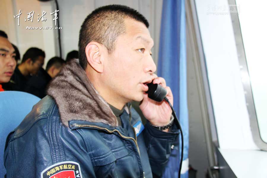 A ship-borne aircraft troop unit of the aviation force under the North China Sea Fleet of the Navy of the Chinese People's Liberation Army (PLA) successfully completed high-intensity landing training for twelve uninterrupted hours recently for the first time and greatly enhanced troop unit's capabilities of ship-helicopter coordination as well as diversified-task performing under complicated weather conditions. (China Military Online/Hu Baoliang)