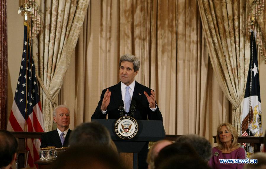 U.S. Secretary of State John Kerry delivers remarks after being sworn in by U.S. Vice President Joe Biden during a ceremonial event in Washington D.C., the United States, Feb. 6, 2013. (Xinhua/Fang Zhe) 