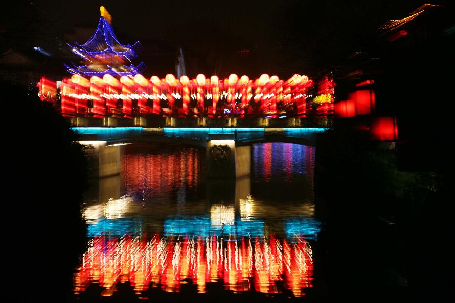 Photo taken on Feb. 6, 2013 shows the lanterns presented on the 2013 Nanjing Qinhuai Lantern Show at the Confucius Temple in Nanjing, capital of east China's Jiangsu Province. Around 500,000 lanterns are displayed during the event to celebrated the upcoming Spring Festival which falls on Feb. 10 this year. (Xinhua) 