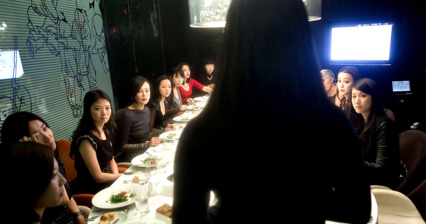 Ladies in the etiquette training. (Photo/Xinhua)