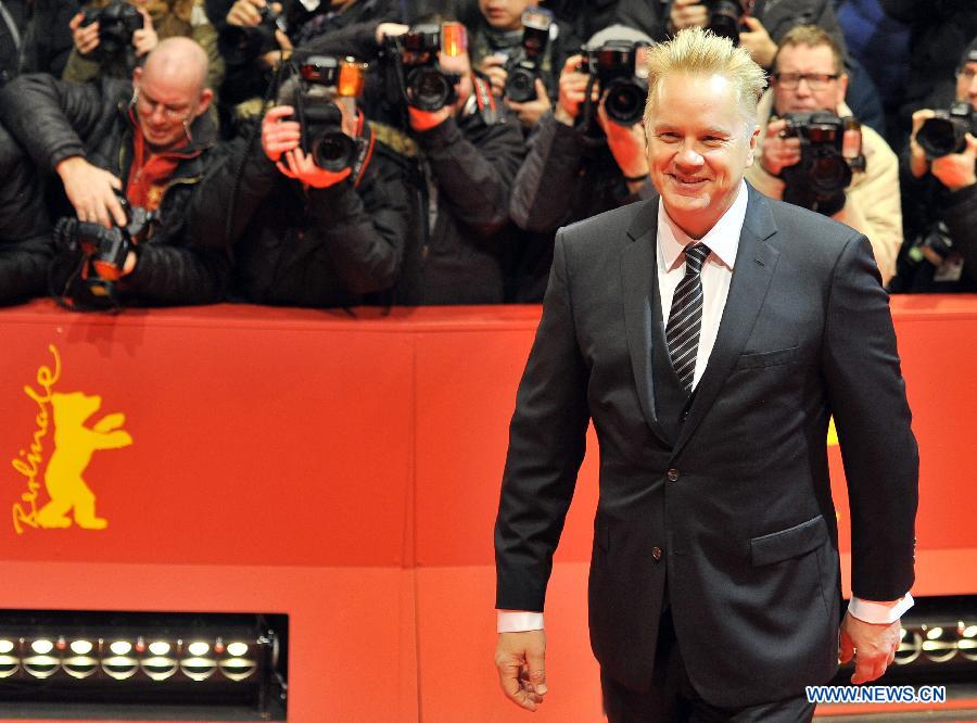 American actor Tim Robbins arrives on the red carpet for the opening ceremony of the 63rd Berlin film festival in Berlin, Germany, on Feb. 7, 2013. The 63rd Berlin film festival opened Thursday with a martial arts epic "The grandmaster" of Chinese director Wong Kar Wai who will also lead the jury of this Berlinale. (Xinhua/Ma Ning) 