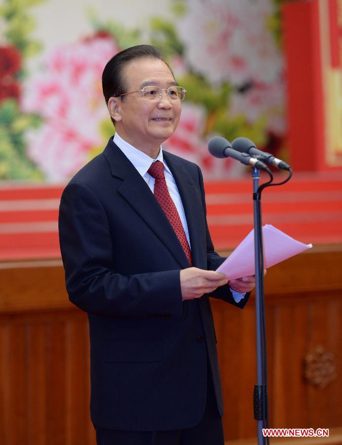Chinese Premier Wen Jiabao addresses a Spring Festival reception held by the Central Committee of the Communist Party of China and the State Council (Cabinet) at the Great Hall of the People in Beijing, capital of China, Feb. 8, 2013. (Xinhua/Li Tao) 