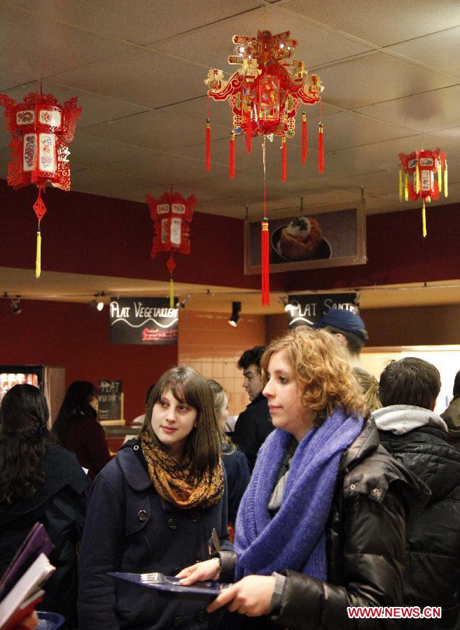 A cafeteria is decorated with traditional Chinese characteristics at Universite Libre de Bruxelles in Brussels, capital of Belgium, Feb. 8, 2013. The university hailed the Chinese Lunar New Year due on Feb. 10 with activities and decorations full of traditional Chinese characteristics. (Xinhua/Wang Xiaojun) 