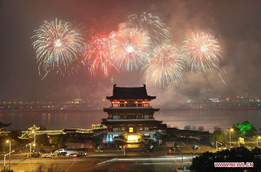 Fireworks paint the skyline at the Chinese Lunar New Year Eve over Changsha, capital of central China's Hunan Province, on Feb. 9, 2013. The Chinese Lunar New Year, or the Spring Festival, begins on Feb. 10 this year and marks the start of the Year of the Snake, according to the Chinese zodiac. (Xinhua/Long Hongtao)
