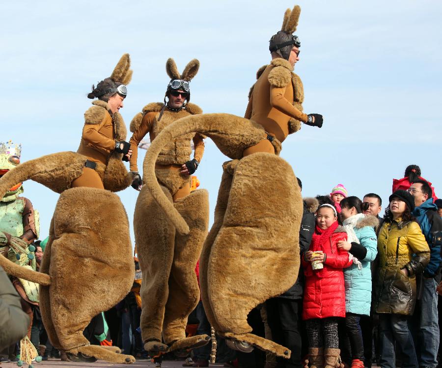 Three performers imitate kangaroos at local event celebrating Chinese Lunar New Year, or Spring Festival, in Beijing, capital of China, Feb. 10, 2013. Various activities were held all over China on Sunday to celebrate the Spring Festival, marking the start of Chinese lunar Year of the snake. The Spring Festival falls on Feb. 10 this year. (Xinhua/Zheng Yong) 
