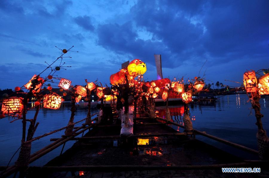 A giant Snake Lantern is displayed to welcome the Chinese lunar New Year, the year of the snake, on Ancol beach in northern Jakarta, Indonesia, Feb. 9, 2013. The Chinese Spring Festival falls on Feb. 10 this year. (Xinhua/Agung Kuncahya B.)