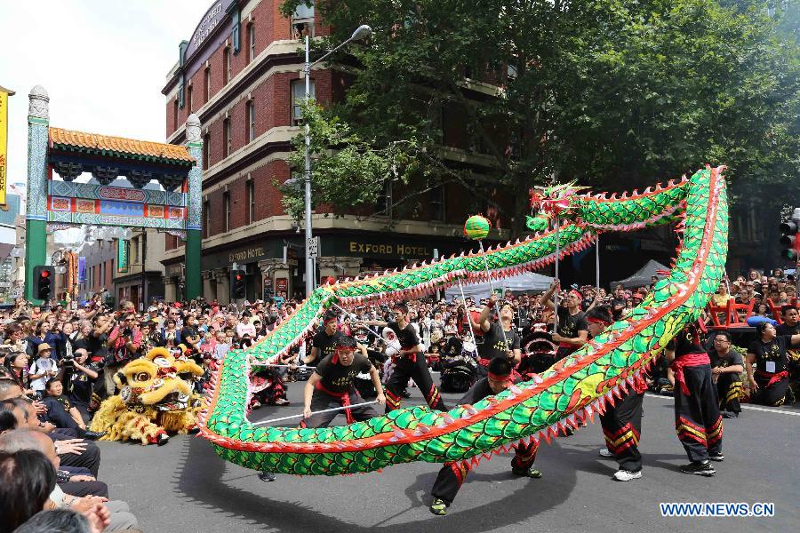 Members of local Chinese societies perform dragon dance in a parade celebrating the Chinese lunar New Year, in Melbourne, Australia, Feb. 10, 2013. The Chinese Spring Festival falls on Feb. 10 this year, marking the start of the Chinese Year of the Snake. (Xinhua/Xu Yanyan)