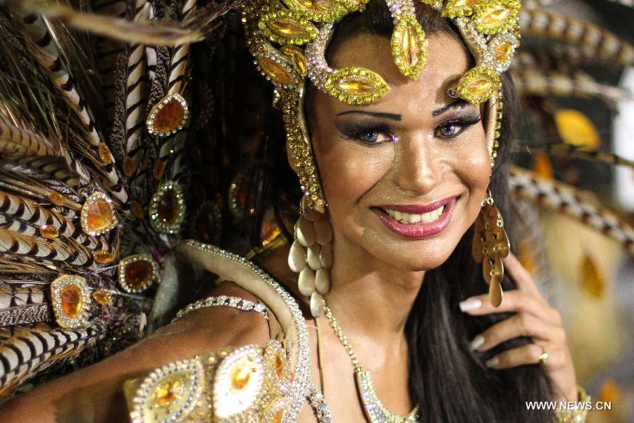 A dancer from the Nene da Vila Matilde Samba School takes part in the carnival celebration, at the Sambadrome, in Sao Paulo, Brazil, on Feb. 9, 2013. (Xinhua/Rahel Patrasso)