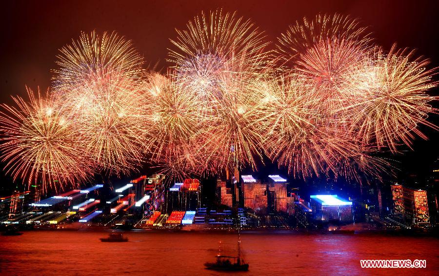 Fireworks light up the Victoria Harbor during the Chinese lunar New Year celebrations in Hong Kong, south China, Feb. 11, 2013. The Chinese lunar New Year this year, the year of snake, started on Feb. 10. (Xinhua/Chen Xiaowei) 