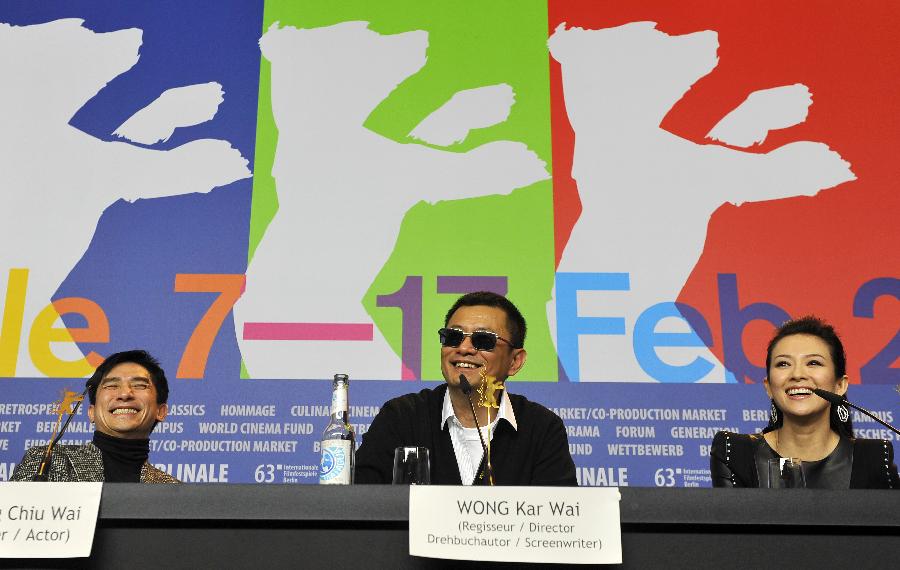 Director Wong Kar Wai(C), actor Tony Leung (L) and actress Zhang Ziyi attend the press conference to promote the film "The Grandmaster" at the 63rd Berlinale film festival in Berlin, Germany, Feb. 7, 2013. The 63rd Berlinale film festival opens Thursday with a martial arts epic "The grandmaster" of Chinese director Wong Kar Wai who will also lead the jury of this Berlinale. (Xinhua/Ma Ning)