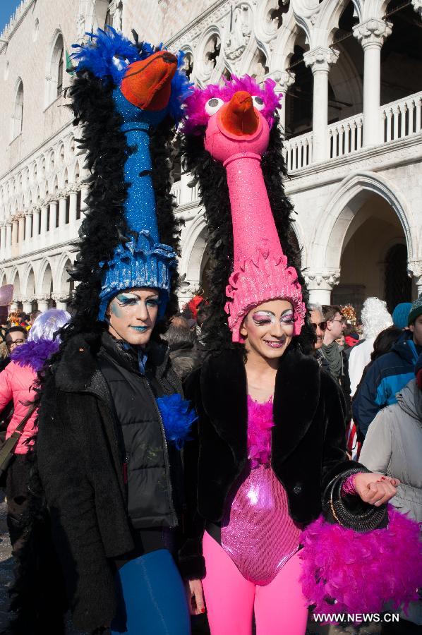 Costumed revellers participate in the carnival in Venice, Italy, on Feb. 10, 2013. The 18-day 2013 Venice carnival will end on Feb. 12. (Xinhua/Huang Xiaozhe) 