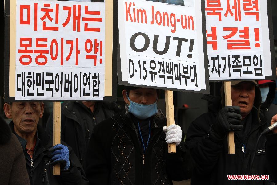 Members of conservative civic groups take part in a demonstration against the third nuclear test by the Democratic People's Republic of Korea (DPRK) in Seoul, South Korea, Feb. 12, 2013. The DPRK said on Tuesday that it has successfully conducted a third nuclear test to safeguard national security against U.S. hostile policy, the official KCNA news agency reported.(Xinhua/Park Jin hee)