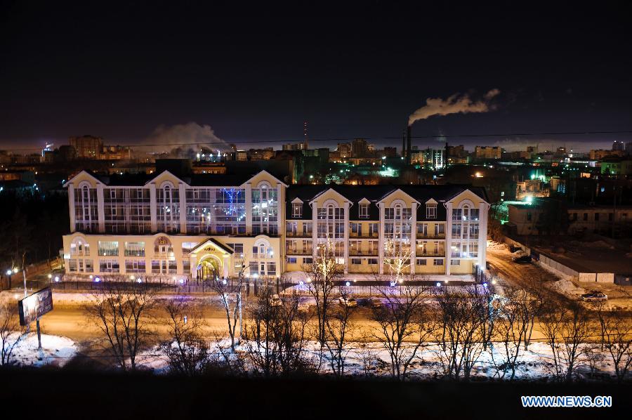 Photo taken on Feb. 16, 2013 shows the night view of Russia's Ural city of Chelyabinsk. Some 1,200 people have been injured and many houses damaged as a meteorite struck Russia's Urals region on Friday. (Xinhua/Jiang Kehong)  