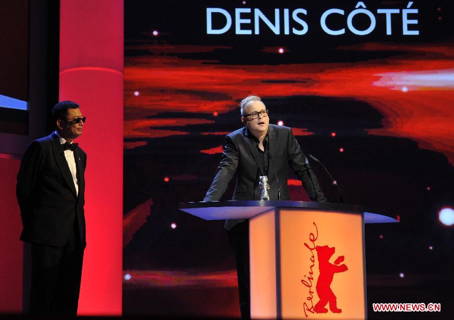 Director Jean-Bernand Marlin addresses the audience after receiving the Golden Bear award for best film of the International Short film jury for "La Fugue" (The Runaway) during the awards ceremony at the 63rd Berlinale International Film Festival in Berlin, Feb. 16, 2013. (Xinhua/Ma Ning) 