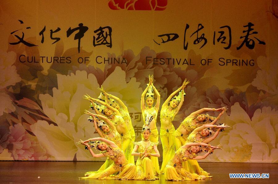 Dancers perform "Thousand-hand Bodhisattva" during the "Cultures of China, Festival of Spring" event celebrating the Chinese lunar New Year, in Miami, the United States, Feb. 15, 2013. Chinese artists, organized by the Overseas Chinese Affairs Office of the Chinese State Council as one of the "Cultures of China, Festival of Spring" performance groups sent abroad to celebrate the Chinese lunar new year every year, presented their show to overseas Chinese people in Miami on Friday. (Xinhua/Fang Zhe)