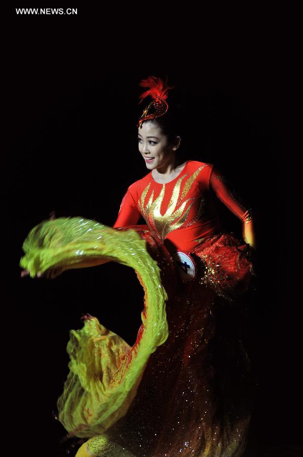 Leah Li, the winner of the Miss Chinatown U.S.A. Pageant 2013, dances during the rehearsal of the pageant in San Francisco, the United States, Feb. 15, 2013. The Miss Chinatown U.S.A. Pageant 2013 closed on Feb. 16. (Xinhua/Liu Yilin)