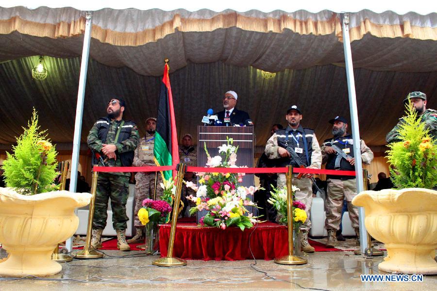 President of the General National Congress of Libya Mohammed Megaryef (C) addresses a celebration for the second anniversary of the uprising that toppled the regime of strongman Muammar Gaddafi in Benghazi, on Feb. 17, 2013. (Xinhua/Mohammed El Shaiky) 