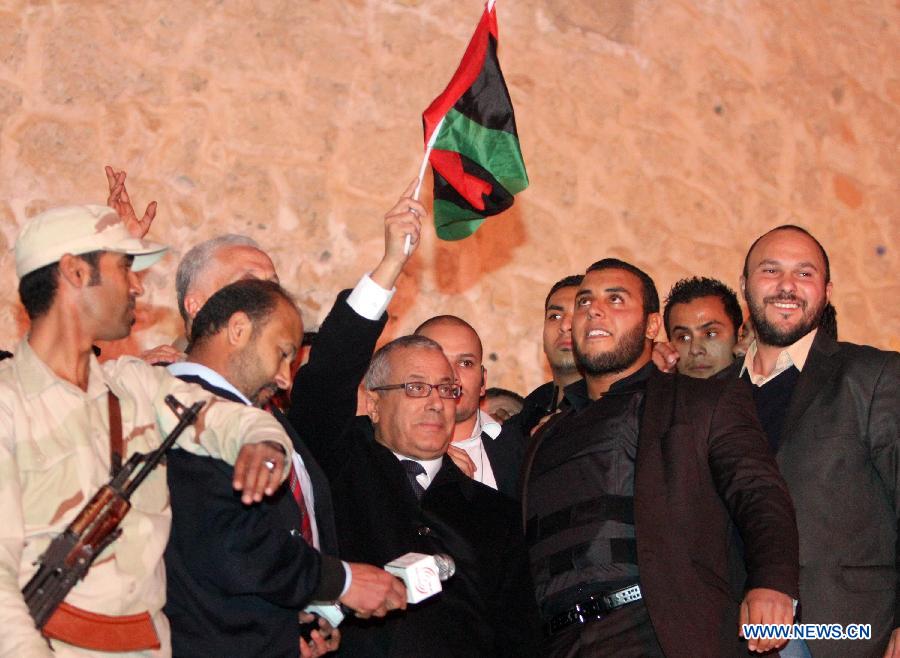  Libyan Prime Minister Ali Zaidan makes a speech during a celebration for the second anniversary of the Libyan uprising at the Martyrs' Square in Tripoli on Feb. 17, 2013. (Xinhua/Hamza Turkia) 