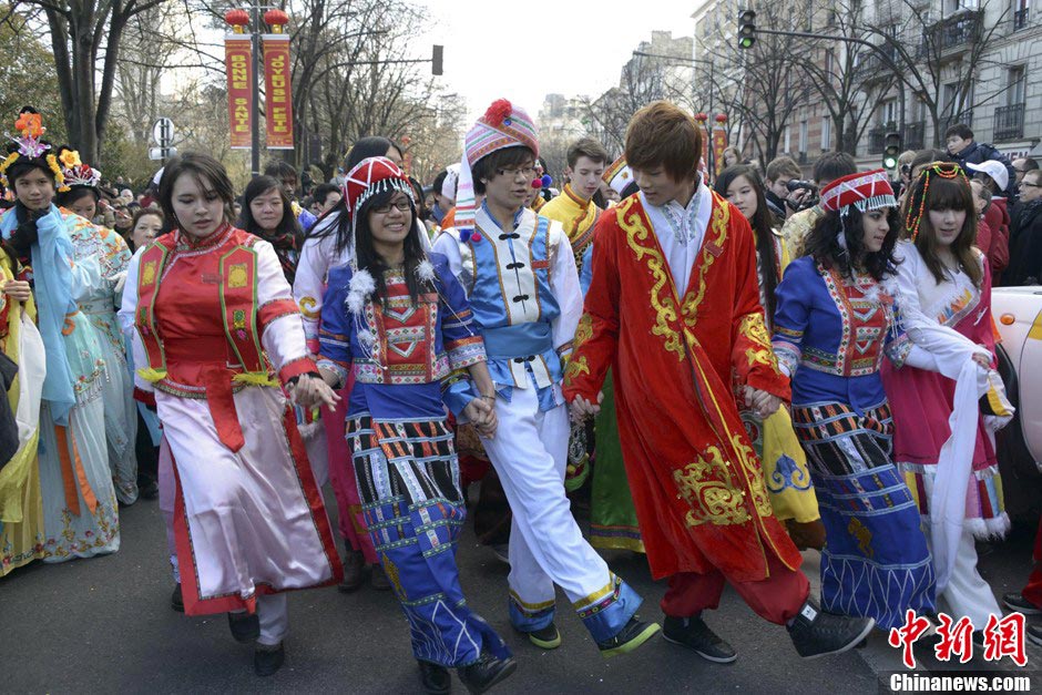 Teenagers in costumes of ancient China participate in a parade to celebrate the traditional Chinese Lunar New Year in Paris, France, February 17, 2013. (CNS/Long Jianwu)