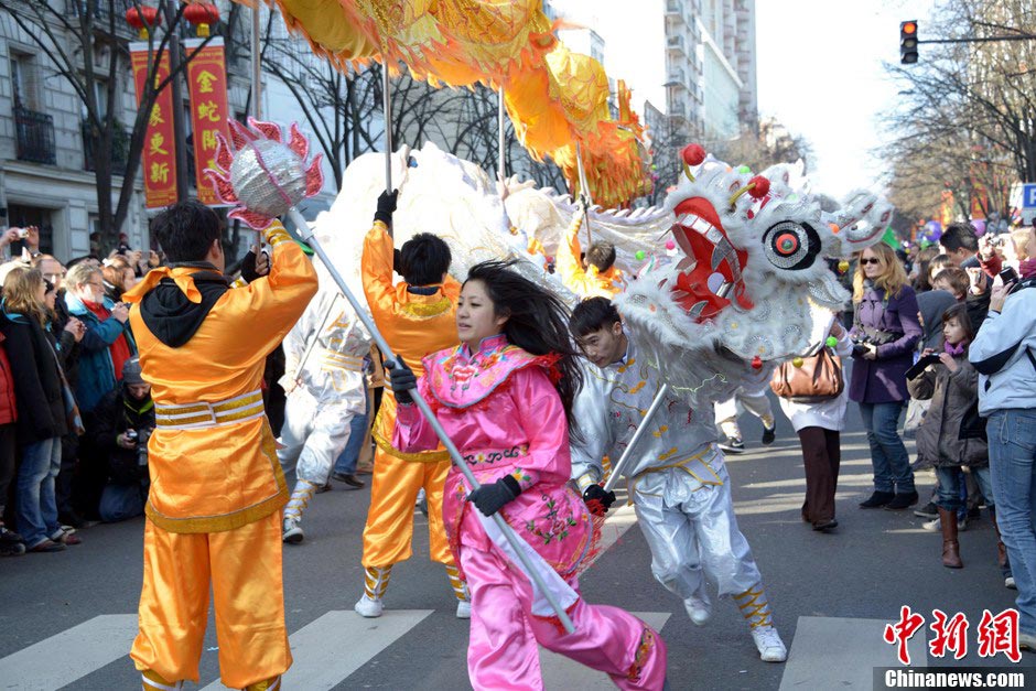 A dragon dance team performs in a parade to celebrate the traditional Chinese Lunar New Year in Paris, France, February 17, 2013. (CNS/Long Jianwu)