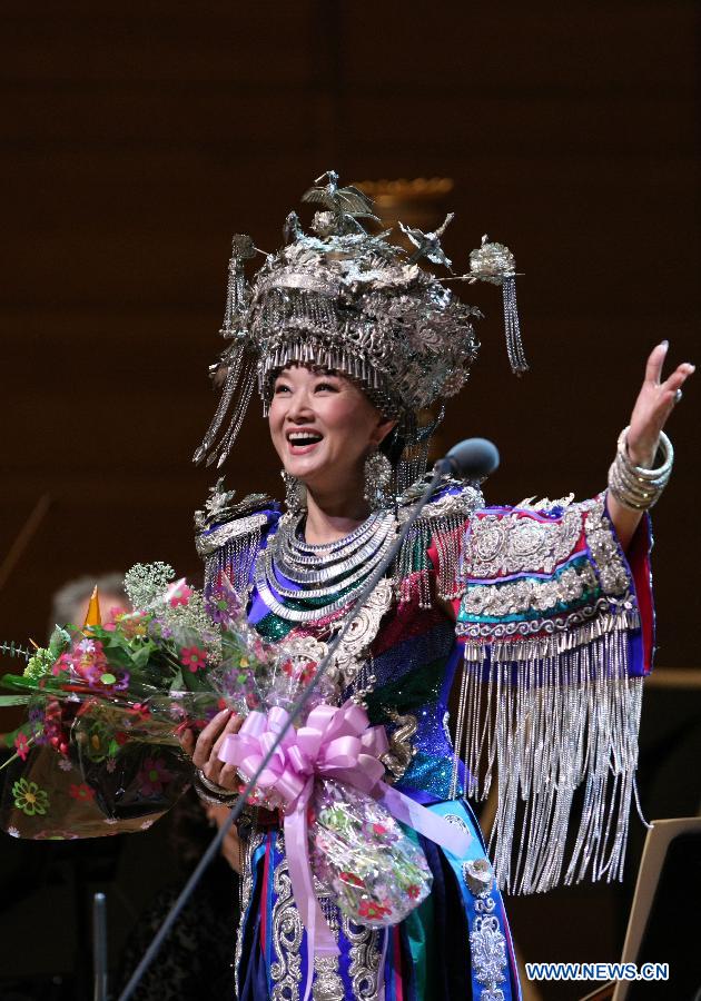 Famous Chinese singer Song Zuying performs during the "Cultures of China, Festival of Spring" performance in Washington D.C., capital of the United States, Feb. 19, 2013. A special concert is dedicated to Song Zuying in this year's "Cultures of China, Festival of Spring" event in the United States from Feb. 16 to March 3.(Xinhua/Fang Zhe)