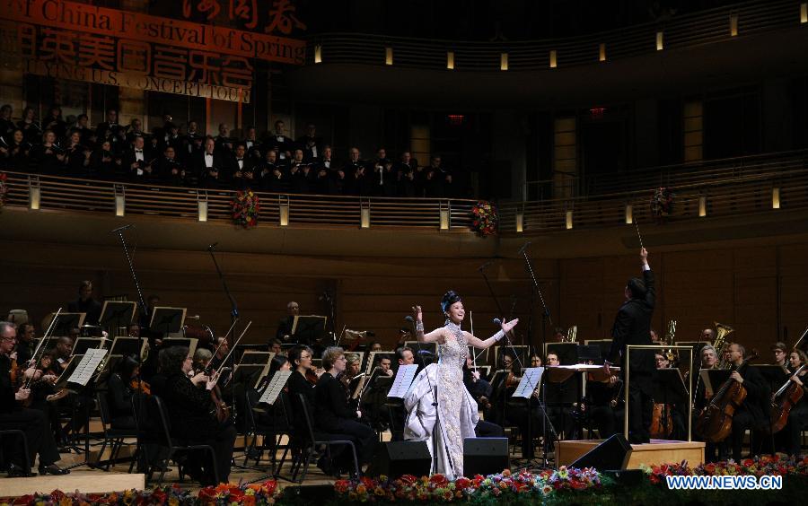 Famous Chinese singer Song Zuying performs during the "Cultures of China, Festival of Spring" performance in Washington D.C., capital of the United States, Feb. 19, 2013. A special concert is dedicated to Song Zuying in this year's "Cultures of China, Festival of Spring" event in the United States from Feb. 16 to March 3.(Xinhua/Fang Zhe)