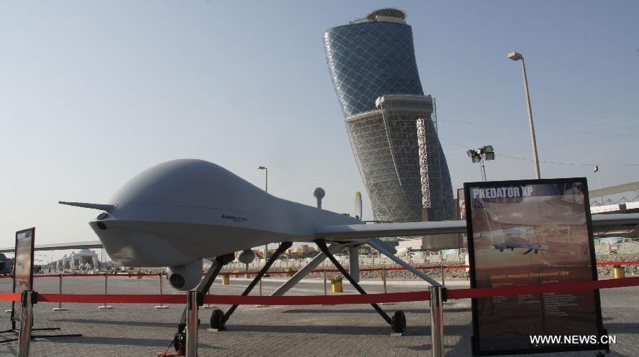 A full-size model of Predator drone is displayed during NAVDEX in Abu Dhabi, the United Arab Emirates, on Feb. 19, 2013. The biennial International Defense Exhibition and Conference (IDEX) 2013, which starts here on Feb. 17, doubled in size compared to 2011 and puts this year a special focus on naval defense and unmanned aerial systems. This year's IDEX hosts NAVDEX, a special platform for the navy ships. (Xinhua/An Jiang) 
