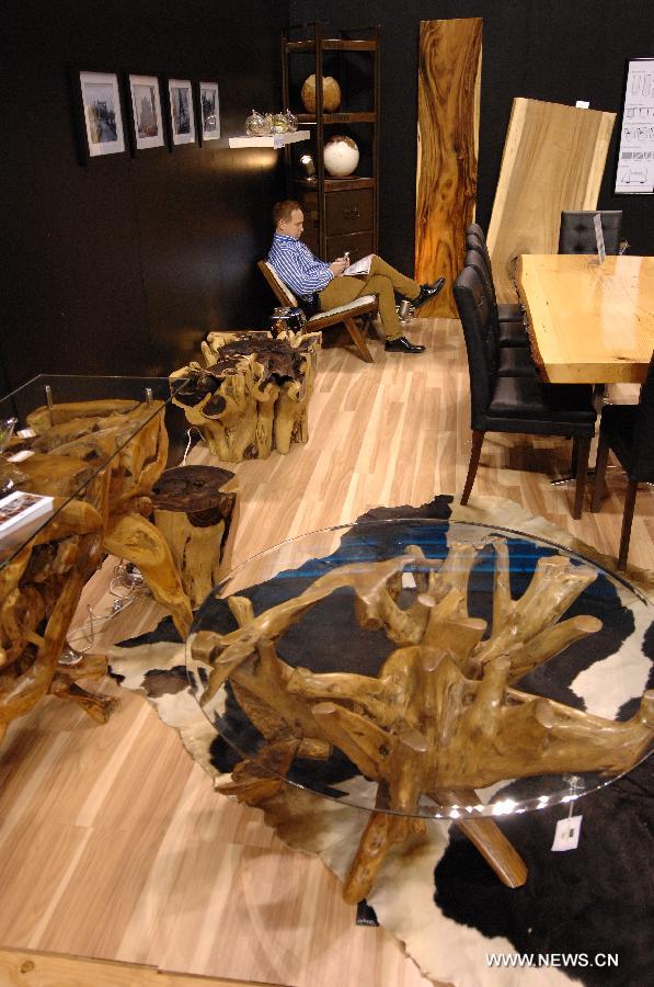 A man takes a rest at the 2013 Home and Garden Show held in Vancouver, Canada, Feb. 20, 2013. The 5-day event kicked off on Wednesday. (Xinhua/Sergei Bachlakov)  