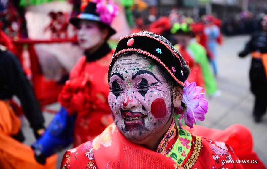 Performers take part in a Shehuo parade in Huangzhong County, northwest China's Qinghai province, Feb. 21, 2013. The performance of Shehuo can be traced back to ancient rituals to worship the earth, which they believe could bring good harvests and fortunes in return. Most Shehuo performances take place around traditional Chinese festivals, especially the Spring Festival and the Lantern Festival. (Xinhua/Zhang Hongxiang) 