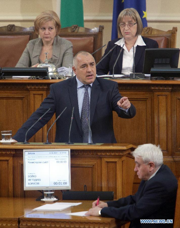 Photo released by Bulgarian Telegraphic Agency (BTA) shows outgoing Bulgarian Prime Minister Boyko Borisov (C) speaking at the parliament in Sofia, Bulgaria, Feb. 21, 2013. Bulgarian parliament on Thursday approved the resignation of the GERB party cabinet, and the Balkan country is heading for parliamentary elections two months before the schedule. (Xinhua) 