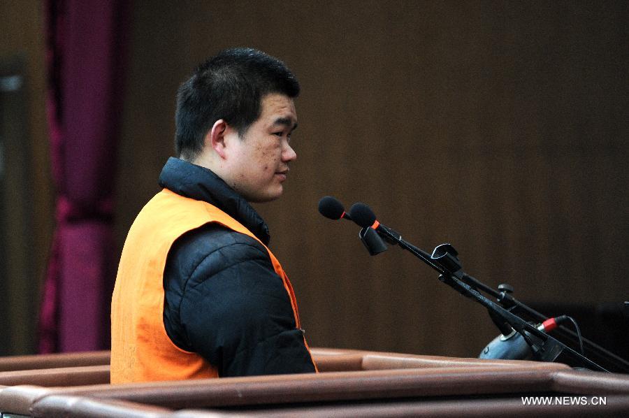 An accused surnamed Lyu stands trial over kidney trafficking at the People's Court of Jianggan District in Hangzhou, capital of east China's Zhejiang Province, Feb. 21, 2013. Nine people, all under the age of 30, stood trial on Feb. 21 for kidney trafficking here. They recruited people who were willing to sell their kidneys and the kidney trafficking ring had recruited 38 people, 11 of whom sold their kidneys before the case was cracked by the Hangzhou police in May 2012. Traffickers could earn between 20,000 and 30,000 yuan (4,805 U.S. dollars) for each kidney. The nine should be prosecuted for the crime of organizing human organ trafficking, according to the procuratorate. The court will sentence the nine at a later date. (Xinhua/Ju Huanzong) 