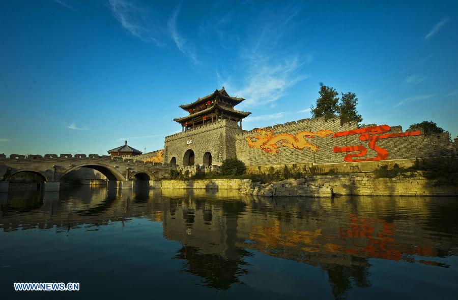 File photo taken on Oct. 10, 2012 shows the scenery of Tai'erzhuang ancient city in Zaozhuang, east China's Shandong Province. Tai'erzhuang ancient city was approved to be the national 5A-level tourist area on Nov. 22, 2012. (Xinhua/Gao Qimin) 
