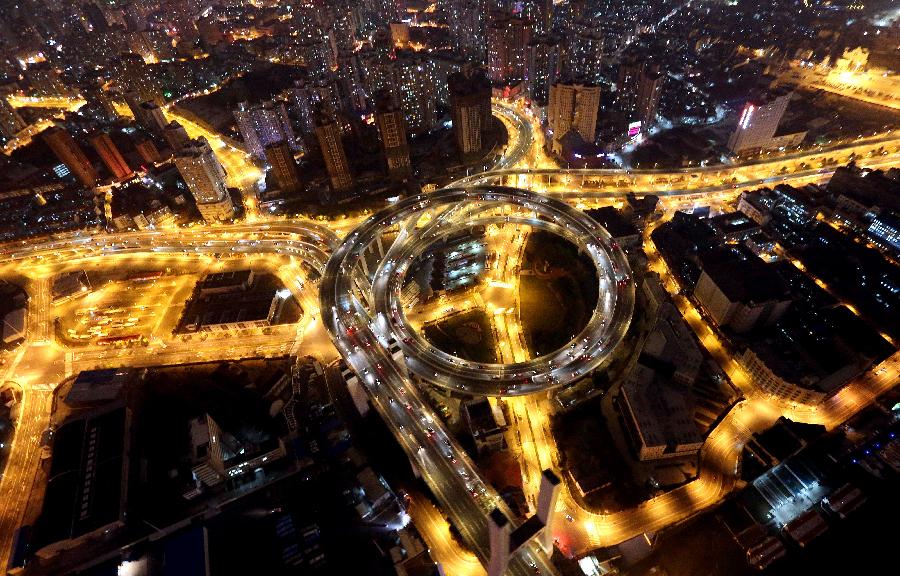 Photo taken on Feb. 24, 2013 shows the aerial view of the approach of the Nanpu Bridge in Shanghai, east China. (Xinhua/Fan Jun) 