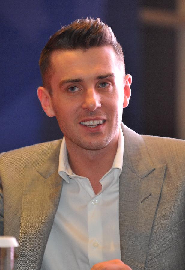 Mark Selby of England attends a news conference for the Haikou World Open snooker tournament in Haikou, south China's Hainan Province, Feb. 24, 2013. (Xinhua/Guo Cheng)