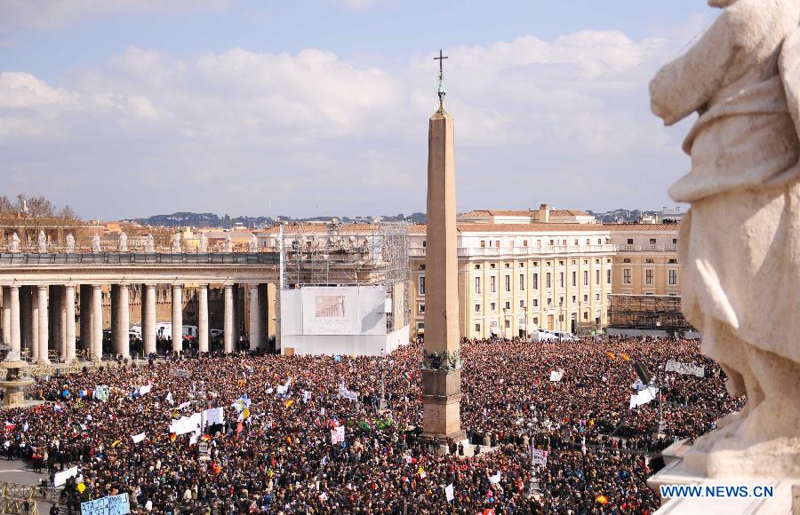 Departing Pope Benedict XVI presides over his final public prayer ceremony on Feb. 24, 2013 in Vatican City, drawing tens of thousands of emotional Catholics, together with tourists from across the world. (Xinhua/Xu Nizhi) 