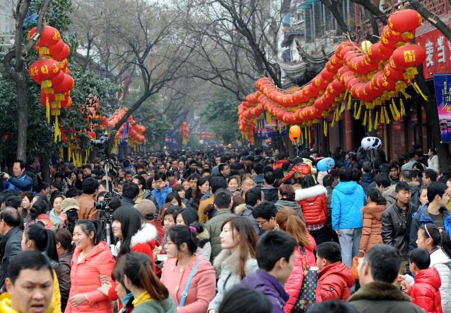 Visitors are seen at the Confucius Temple in Nanjing, capital of east China's Jiangsu Province, Feb. 24, 2013. On the Lantern Festival, tens of thousands of visitors came to the Confucius Temple, a famous tourist destination in Nanjing. (Xinhua/Sun Can)