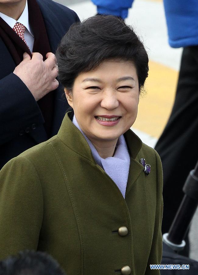South Korean President Park Geun-hye smiles during her inauguration ceremony in Seoul, South Korea, Feb. 25, 2013. Park Geun-hye, the daughter of South Korea's late military strongman Park Chung-Hee, was sworn in as the country's first female president on Monday. (Xinhua/Park Jin Hee)