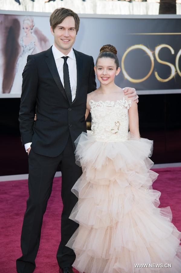 Best Live Action Short Film nominee Shawn Christensen (L) arrives with model Fatima Ptacek at the Oscars at the Dolby Theatre in Hollywood, California on Feb. 24, 2013. (Xinhua/Matt Brown) 