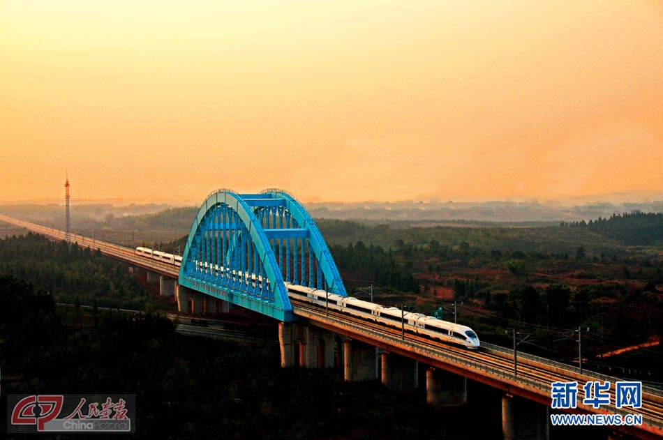 A beautiful train conductor. (Photo/Xinhua)