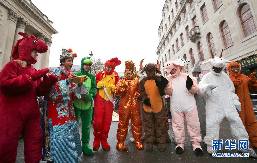 Several actors dressed as the Chinese God of Wealth and the 12 zodiac animals participate in the parade in the center of London on Feb. 10, 2013. Chinese Associations of London Chinatown held the annual celebrations for the Chinese Lunar New Year on the day. (Xinhua/Yin Gang)