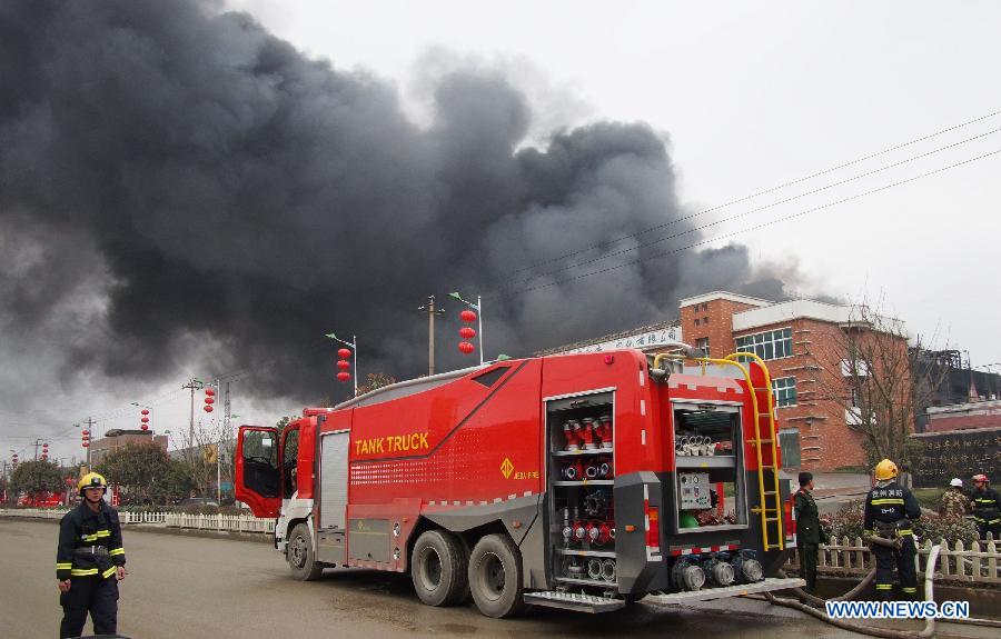 Firemen work on the scene of a chemical plant blast in Baiyun District of Guiyang, capital of southwest China's Guizhou Province, Feb. 25, 2013. At least five people were injured in a chemical plant explosion in Guiyang on Monday morning. Part of the plant, which belongs to Bestchem, a local chemical company, was still burning by noon. Firefighters have been deployed to the blast scene while local environmental authorities are keeping an eye on the air quality. (Xinhua/Liu Xu)  