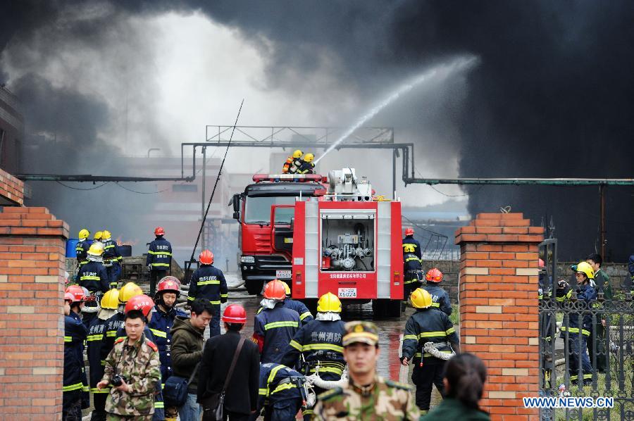 Firemen work on the scene of a chemical plant blast in Baiyun District of Guiyang, capital of southwest China's Guizhou Province, Feb. 25, 2013. At least five people were injured in a chemical plant explosion in Guiyang on Monday morning. Part of the plant, which belongs to Bestchem, a local chemical company, was still burning by noon. Firefighters have been deployed to the blast scene while local environmental authorities are keeping an eye on the air quality. (Xinhua/Liu Xu) 
