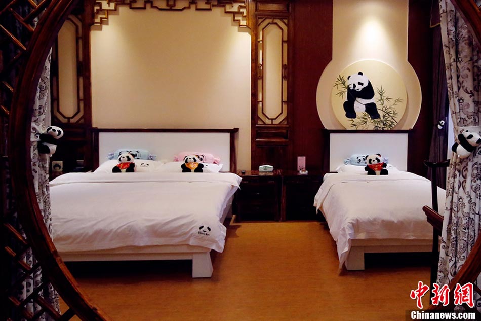 A new panda-themed hotel has opened at the foot of Emei Mountain, Southwest China's Sichuan province, Feb 25, 2013. The hotel is reportedly the first panda-themed hotel in the world. (Photo/CNS)