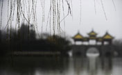 Poetic and picturesque Slender West Lake in rain